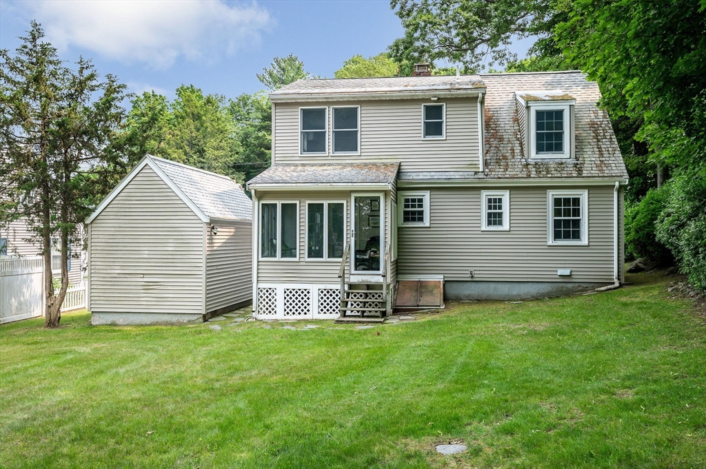 15 Eustis Avenue Wakefield, MA 01880 - Photo 36 of 42 a view of a house with a yard and sitting area