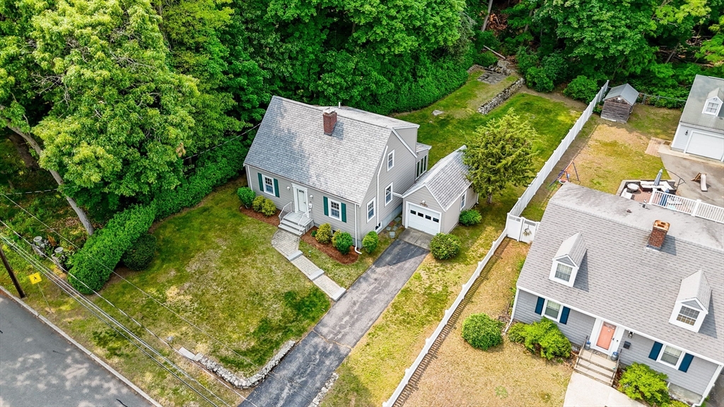 15 Eustis Avenue Wakefield, MA 01880 - Photo 37 of 42 an aerial view of a house with garden space and street view