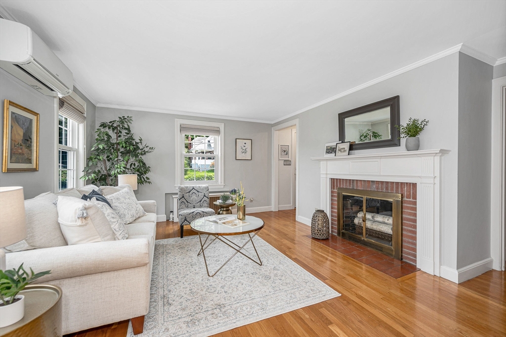 15 Eustis Avenue Wakefield, MA 01880 - Photo 4 of 42 a living room with furniture and a fireplace