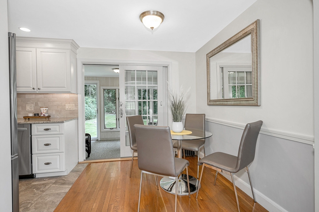 15 Eustis Avenue Wakefield, MA 01880 - Photo 5 of 42 a view of a dining room with furniture and wooden floor