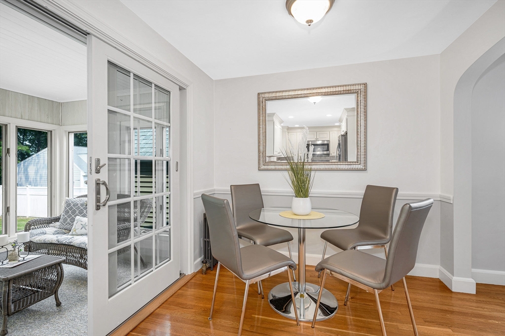 15 Eustis Avenue Wakefield, MA 01880 - Photo 6 of 42 a view of a dining room with furniture and wooden floor