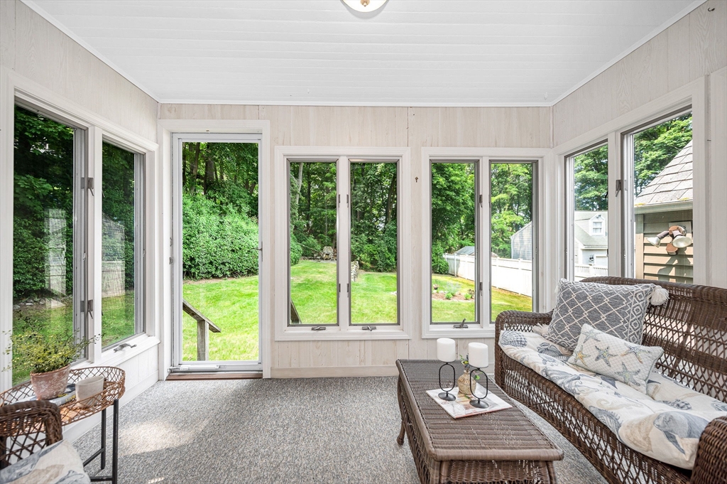 15 Eustis Avenue Wakefield, MA 01880 - Photo 10 of 42 a living room with furniture and a large window