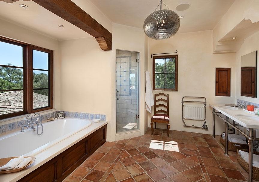 285 Gould Lane Montecito, CA 93108 - Photo 5 of 13 a spacious bathroom with a tub a double vanity sink a mirror and a shower