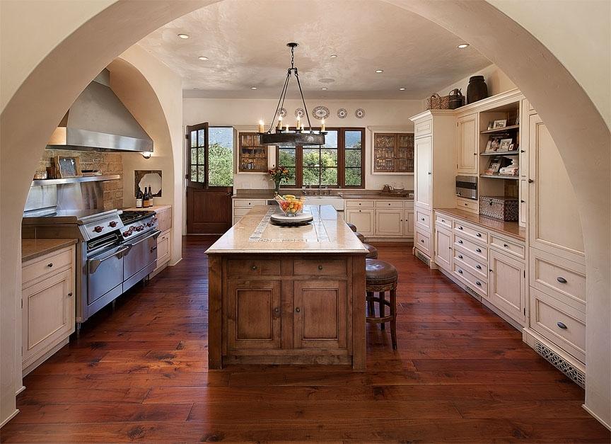 285 Gould Lane Montecito, CA 93108 - Photo 8 of 13 a kitchen with stainless steel appliances kitchen island granite countertop a stove a sink and a refrigerator