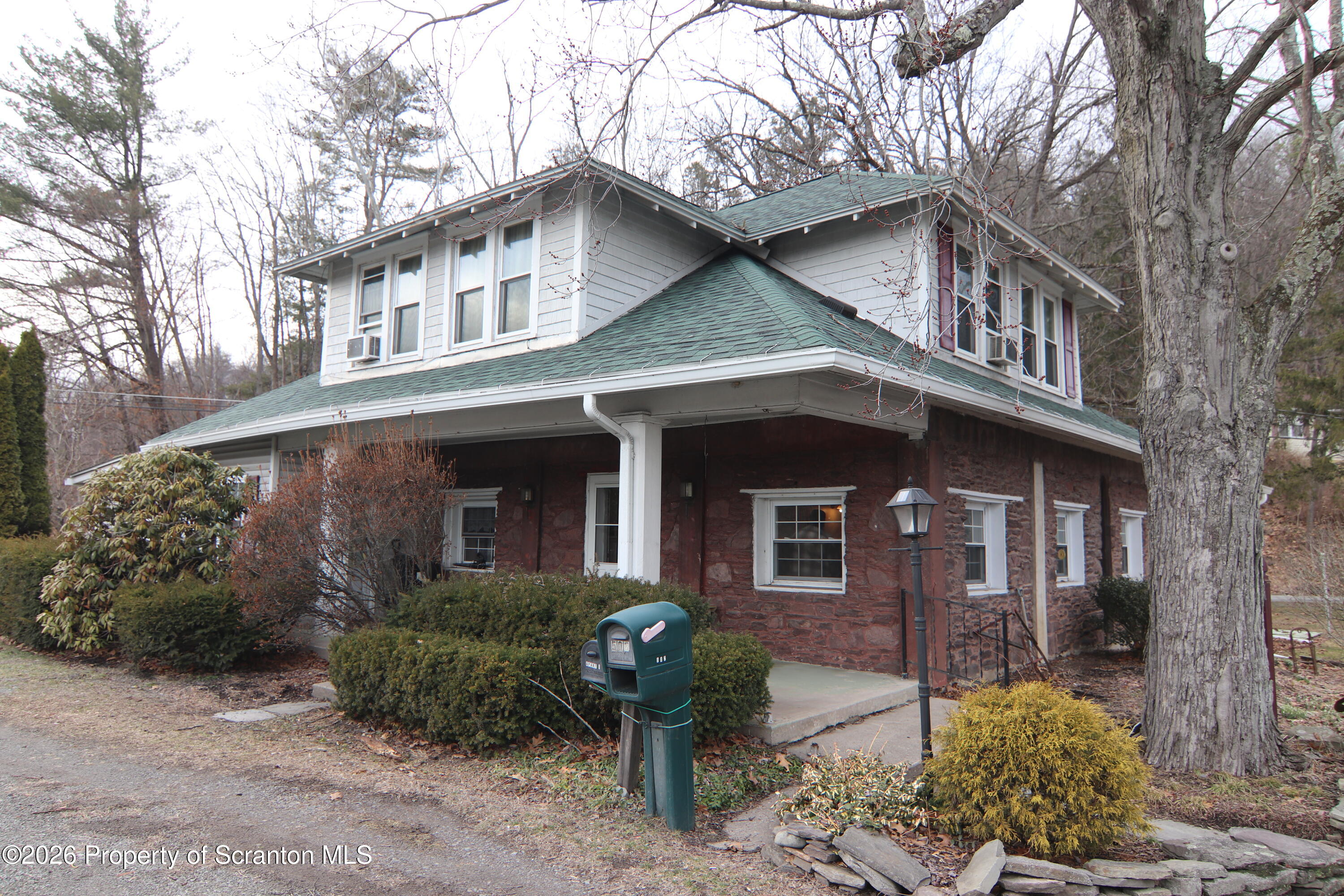 502 State Rte 92 South Tunkhannock, PA 18657 - Photo 52 of 52 a front view of a house with garden