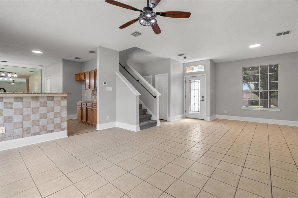 10618 Newcastleton Lane Rowlett, TX 75089 - Photo 2 of 13 a view of an empty room and window