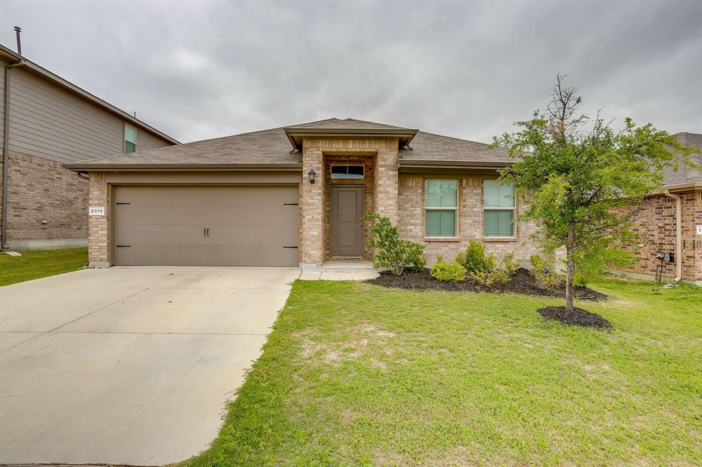 2313 Stallings Road Fort Worth, TX 76108 - Photo 1 of 30 a front view of a house with garden