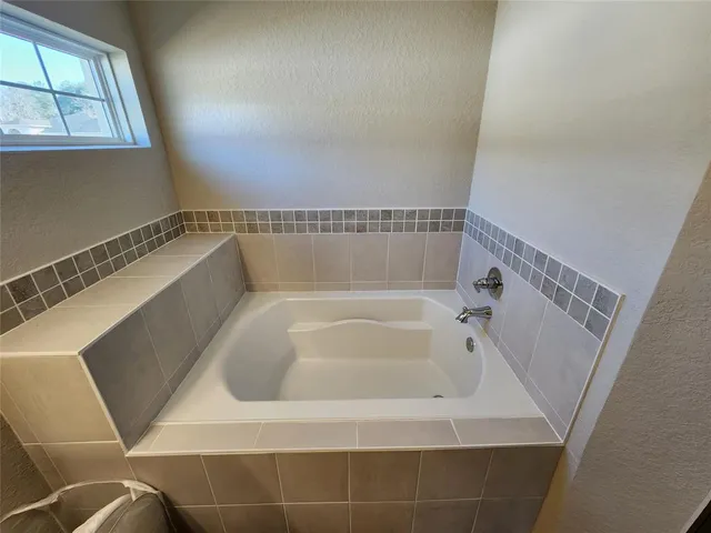 a bathroom with a bathtub