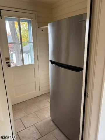 a view of walk in closet with window