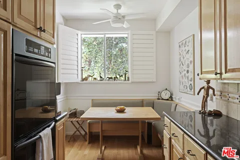 a bedroom with a bed and furniture