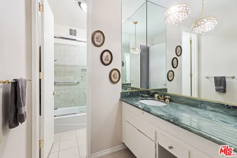 a bathroom with a shower and bathtub