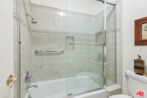 a view of a patio with swimming pool table and chairs