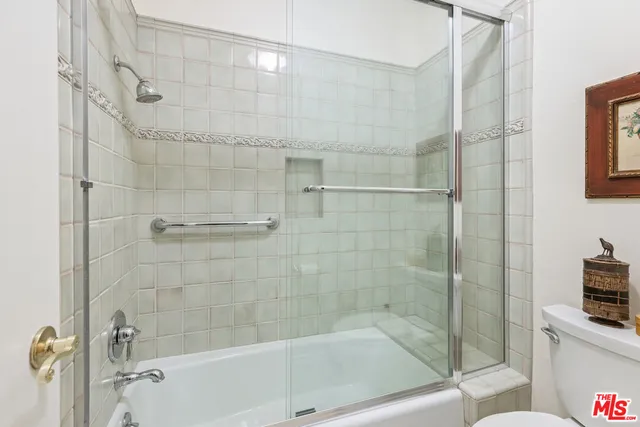 a view of a patio with swimming pool table and chairs