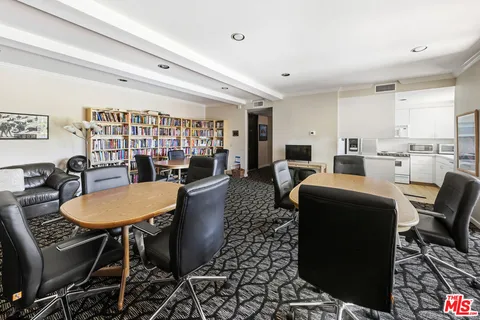 a bathroom with a shower and mirror