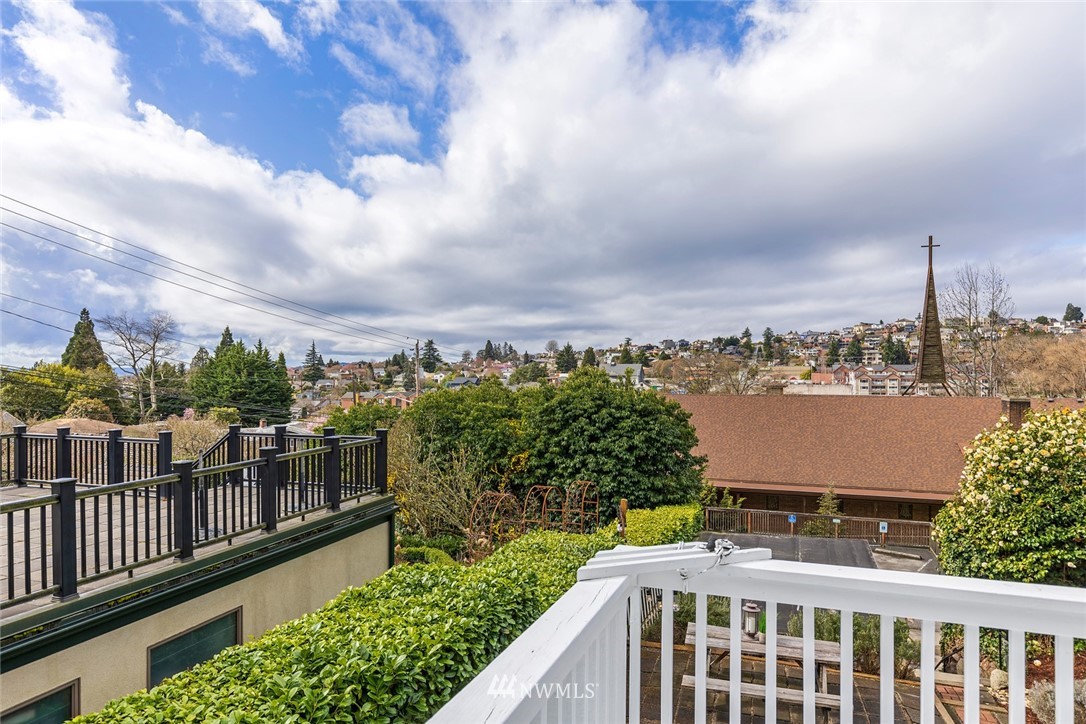 2409 30th Avenue West Seattle, WA 98199 - Photo 18 of 38 a view of a city from a balcony
