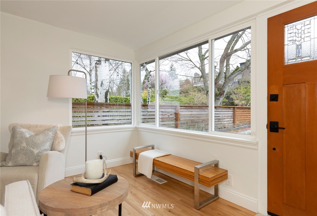 2409 30th Avenue West Seattle, WA 98199 - Photo 7 of 38 a living room with furniture and a window