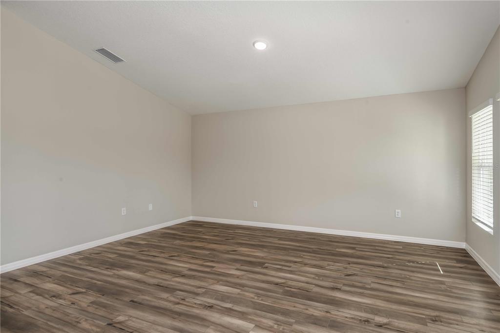 1338 Palmeroy Road Haines City, FL 33844 - Photo 16 of 32 wooden floor in a room