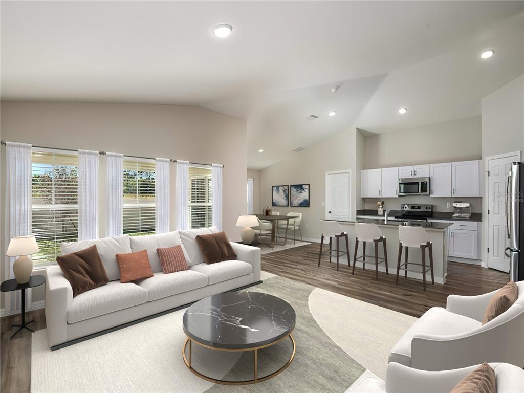 1338 Palmeroy Road Haines City, FL 33844 - Photo 2 of 32 a living room with furniture and a large window