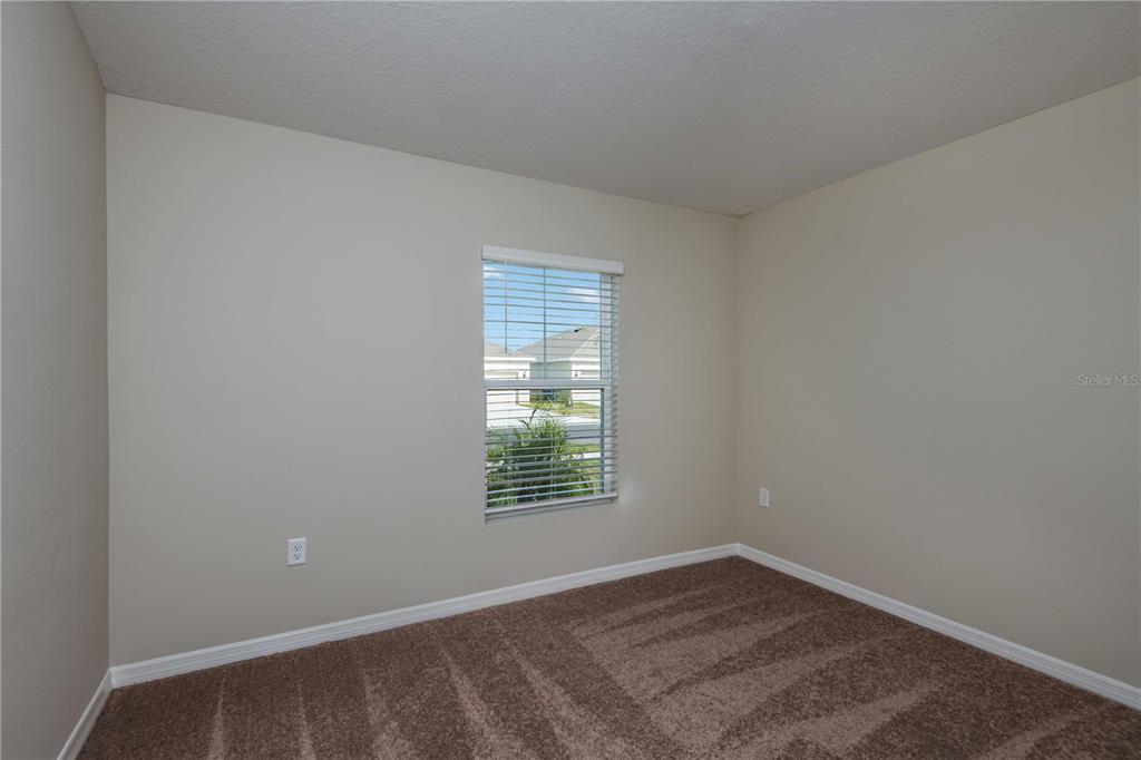 1338 Palmeroy Road Haines City, FL 33844 - Photo 25 of 32 an empty room with a window