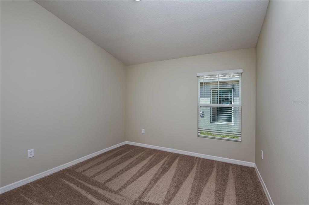 1338 Palmeroy Road Haines City, FL 33844 - Photo 27 of 32 an empty room with a window