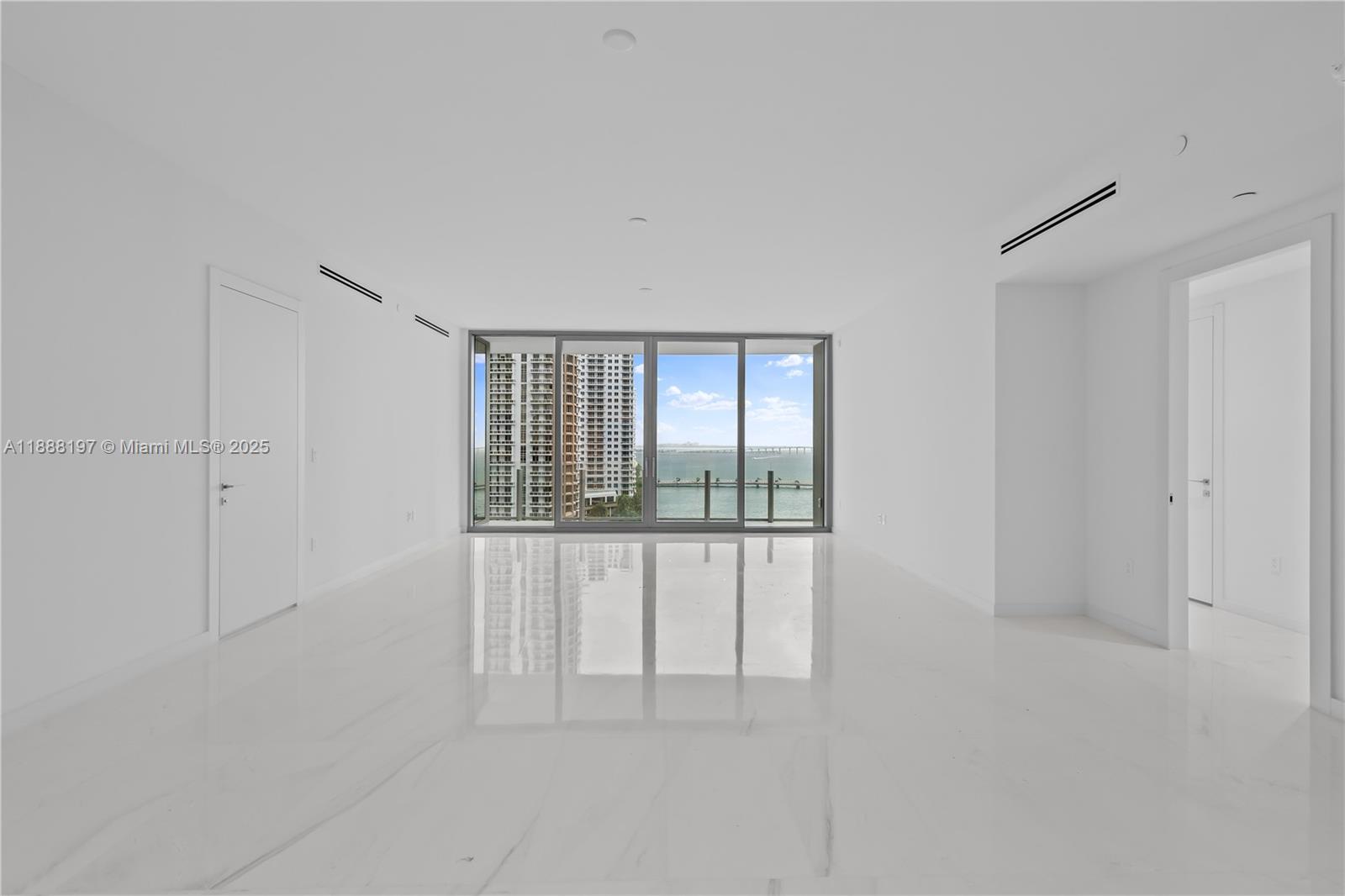 300 Biscayne Blvd Way, Unit 1103 Miami, FL 33131 - Photo 11 of 47 a view of an empty room with a window