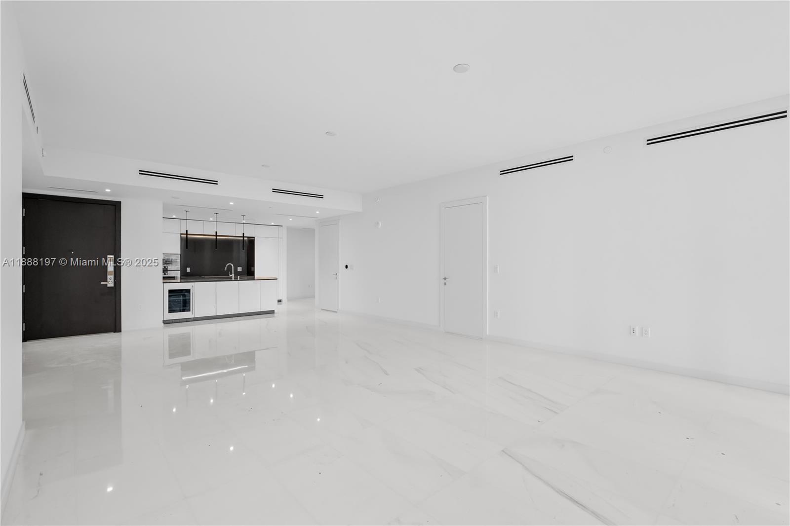 300 Biscayne Blvd Way, Unit 1103 Miami, FL 33131 - Photo 13 of 47 a view of a livingroom with a stove and kitchen space