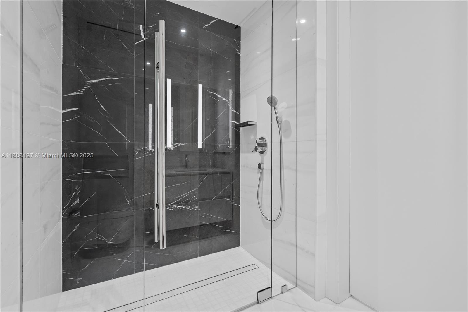 300 Biscayne Blvd Way, Unit 1103 Miami, FL 33131 - Photo 16 of 47 a bathroom with a shower