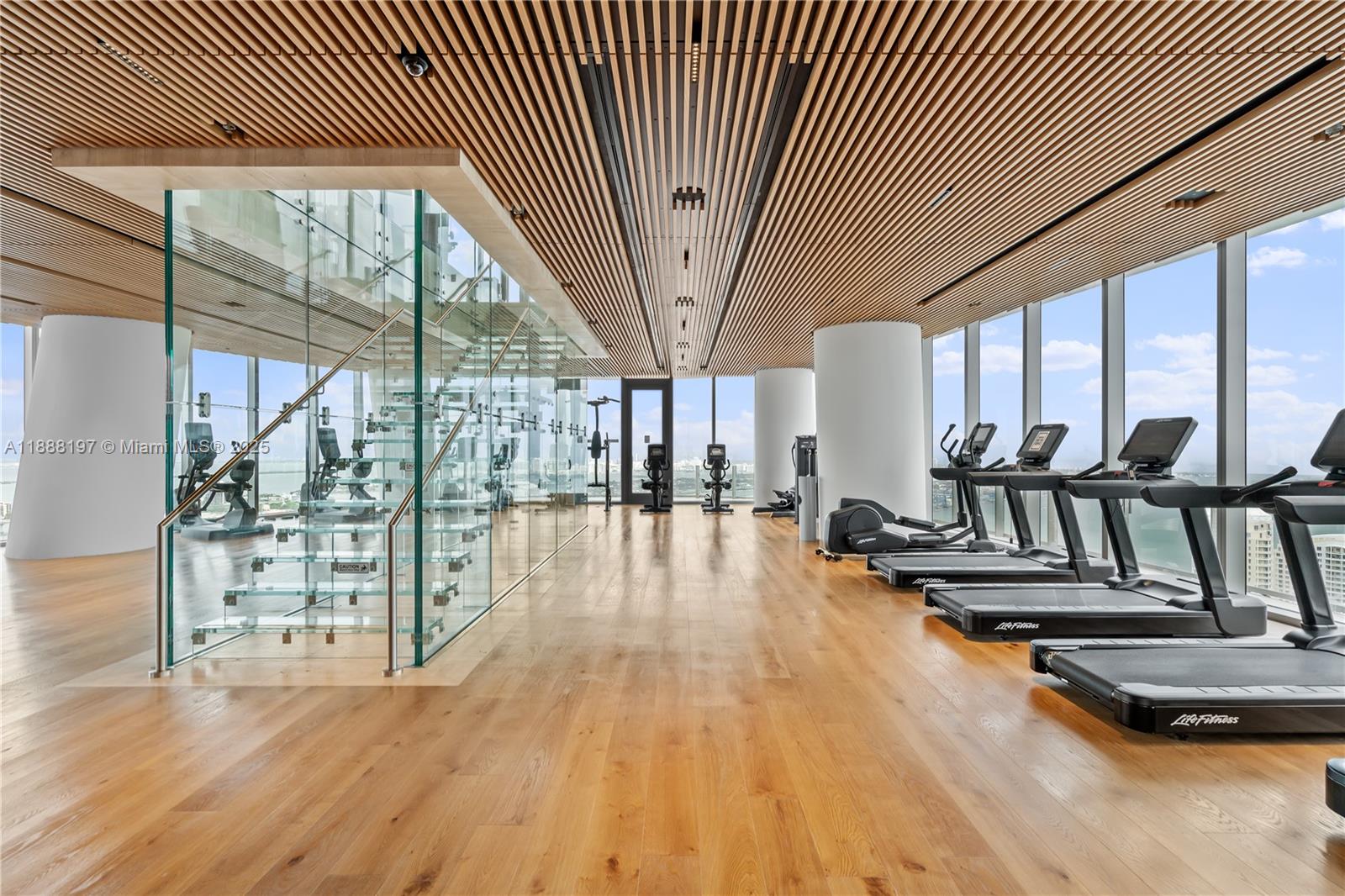 300 Biscayne Blvd Way, Unit 1103 Miami, FL 33131 - Photo 39 of 47 a view of a hall with wooden floor