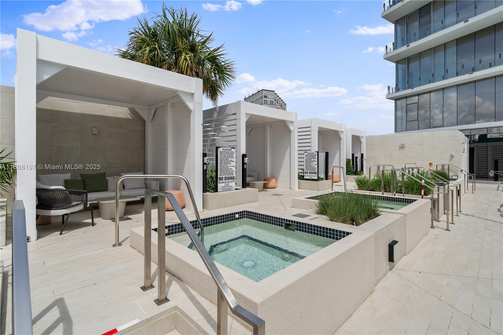 300 Biscayne Blvd Way, Unit 1103 Miami, FL 33131 - Photo 44 of 47 a view of a house with backyard and sitting area