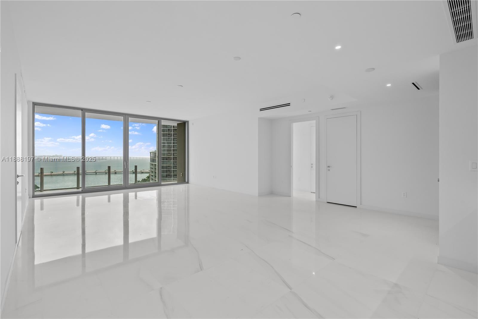 300 Biscayne Blvd Way, Unit 1103 Miami, FL 33131 - Photo 10 of 47 a view of an empty room with a window
