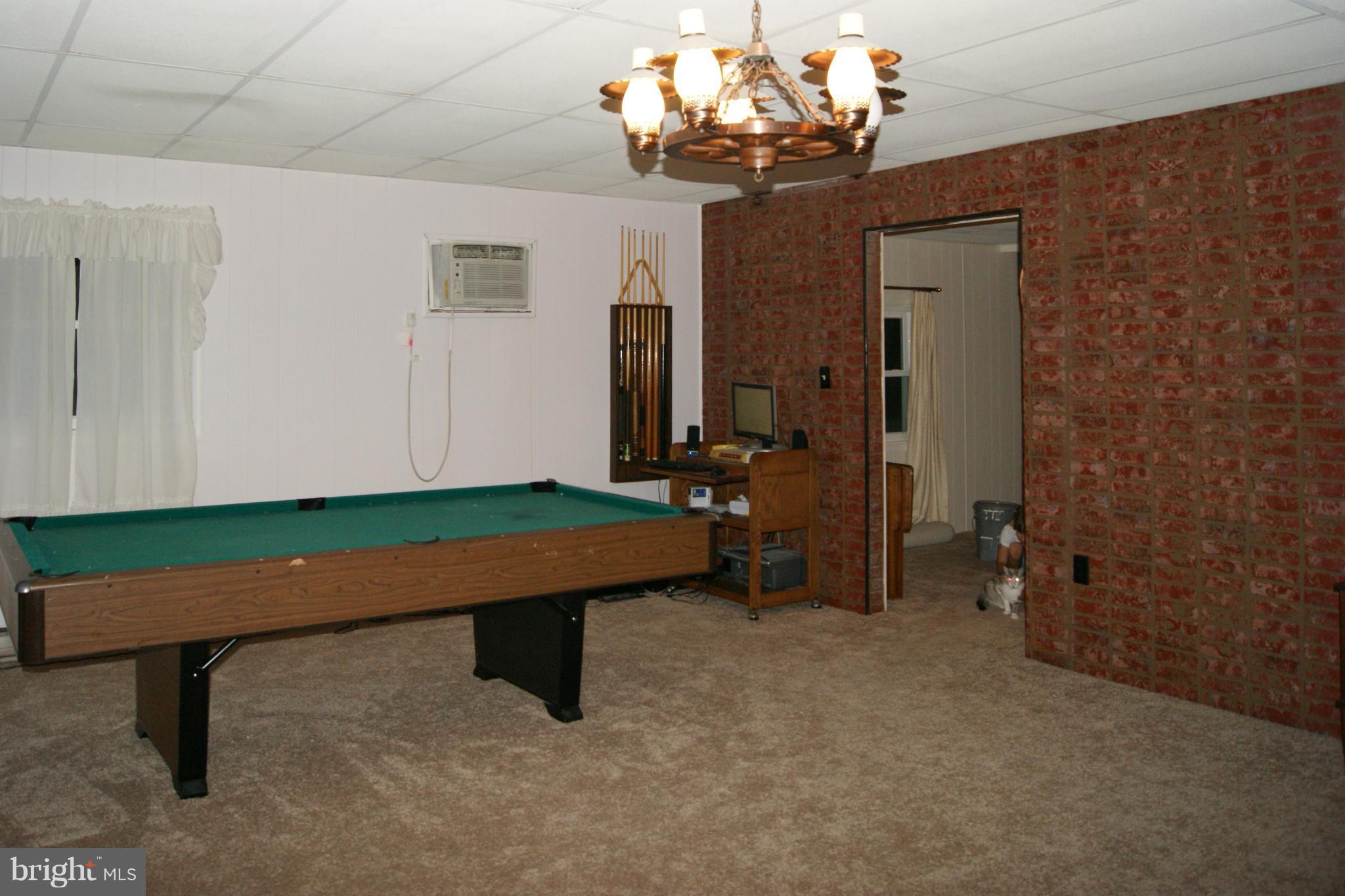 6805 Mackall Road St. Leonard, MD 20685 - Photo 17 of 30 a room with pool table and windows