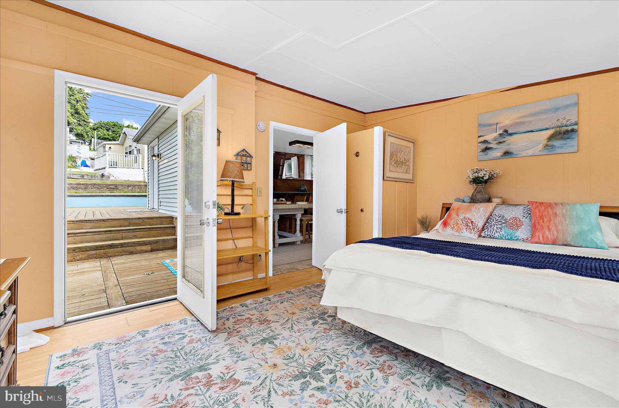 25 Locust Street Earleville, MD 21919 - Photo 25 of 64 a bedroom with a bed and a large window
