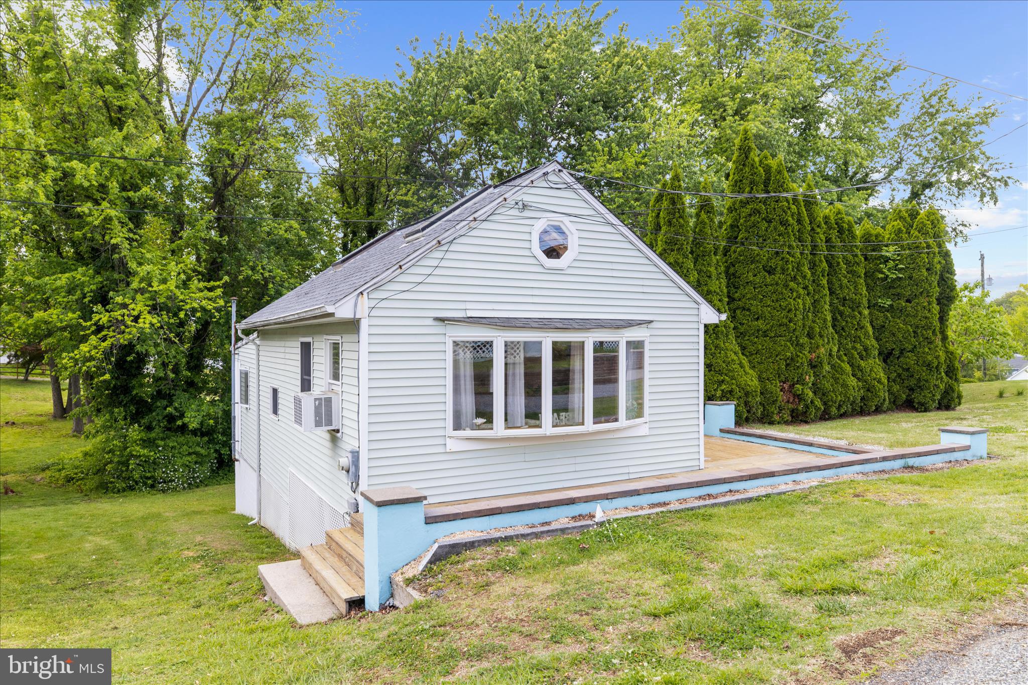 25 Locust Street Earleville, MD 21919 - Photo 7 of 64 a front view of a house with a yard