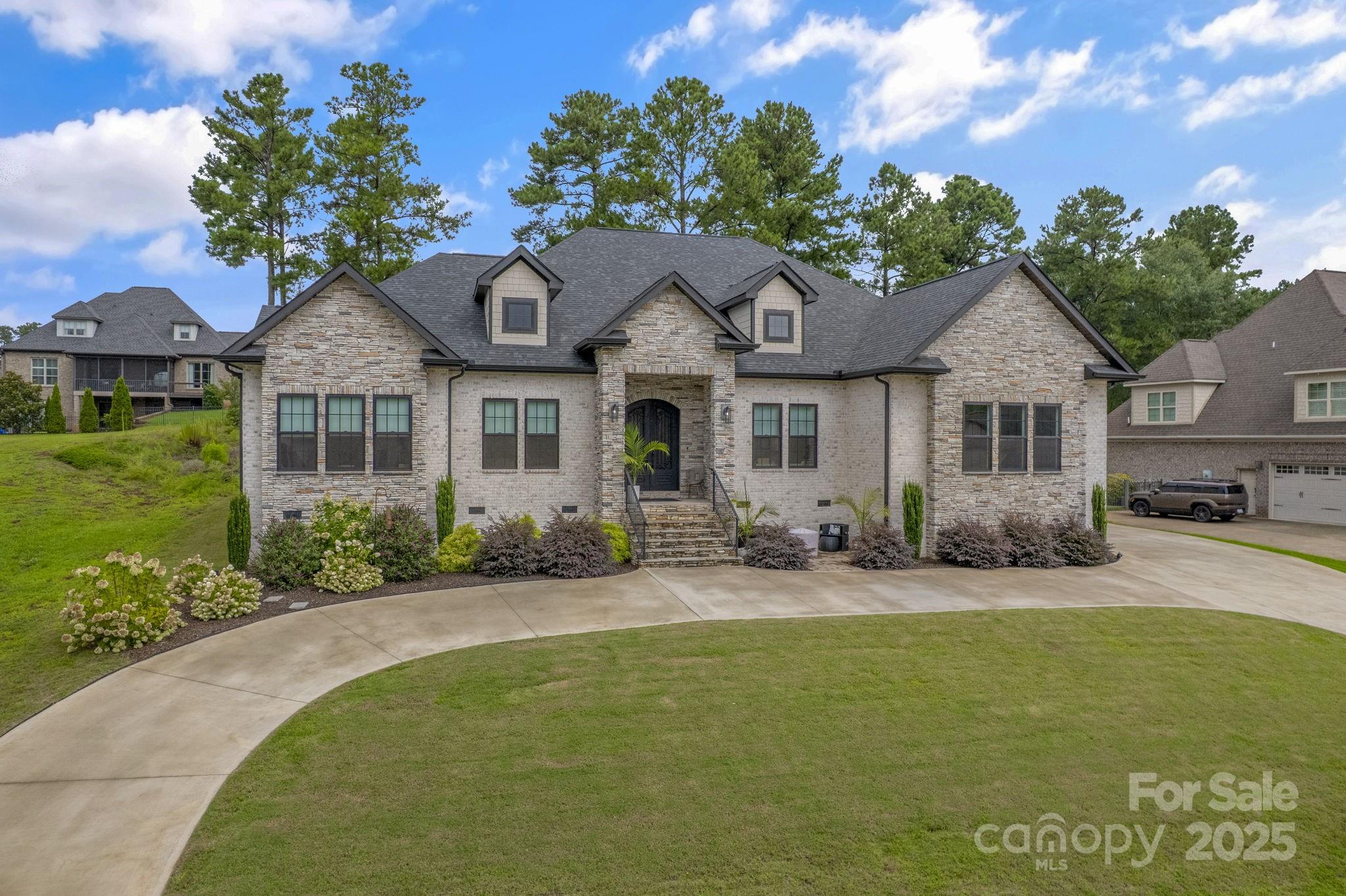 416 World Tour Drive Inman, SC 29349 - Photo 2 of 45 a front view of a house with yard and green space