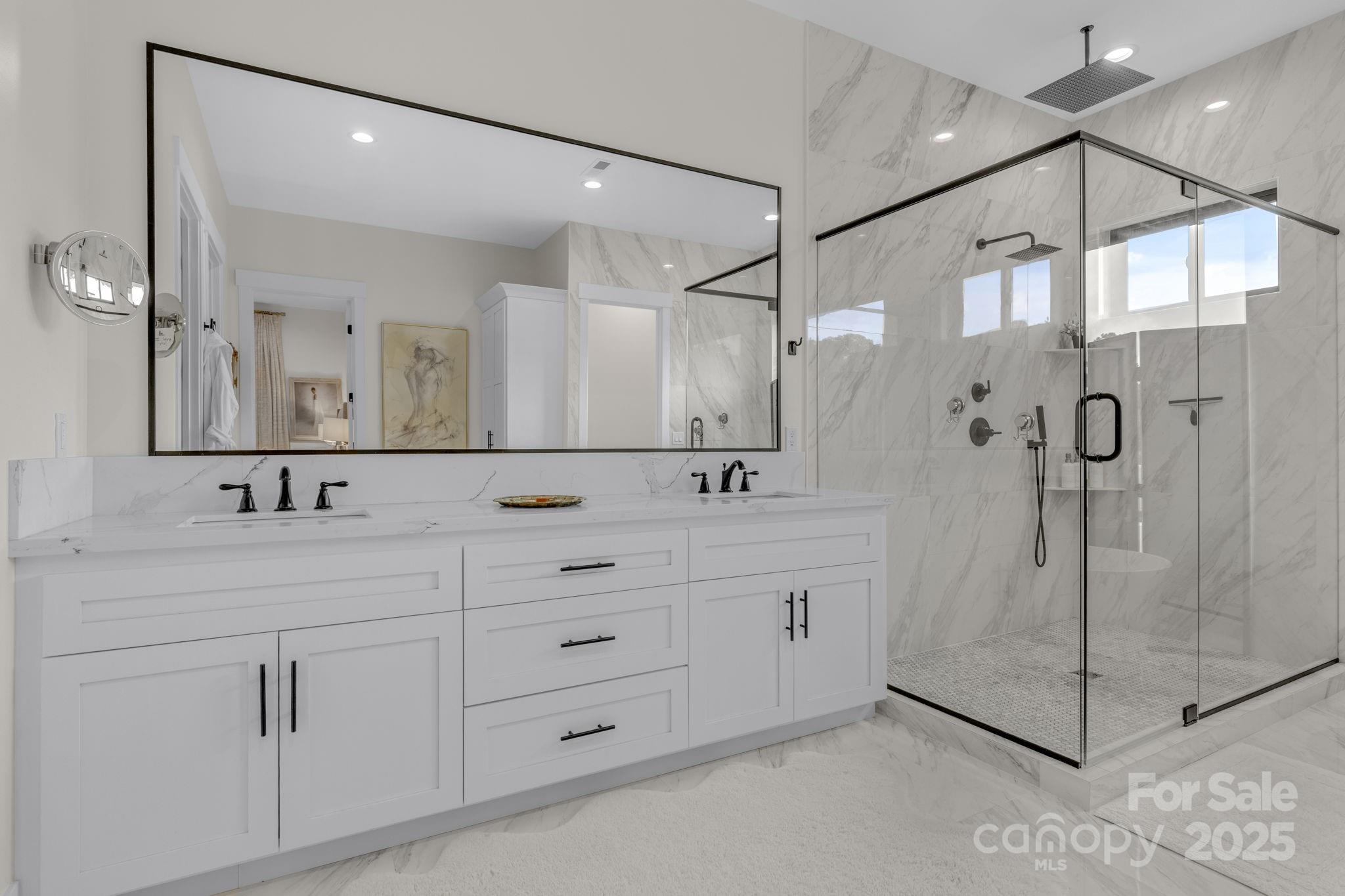 416 World Tour Drive Inman, SC 29349 - Photo 21 of 45 a bathroom with a double vanity sink mirror and shower