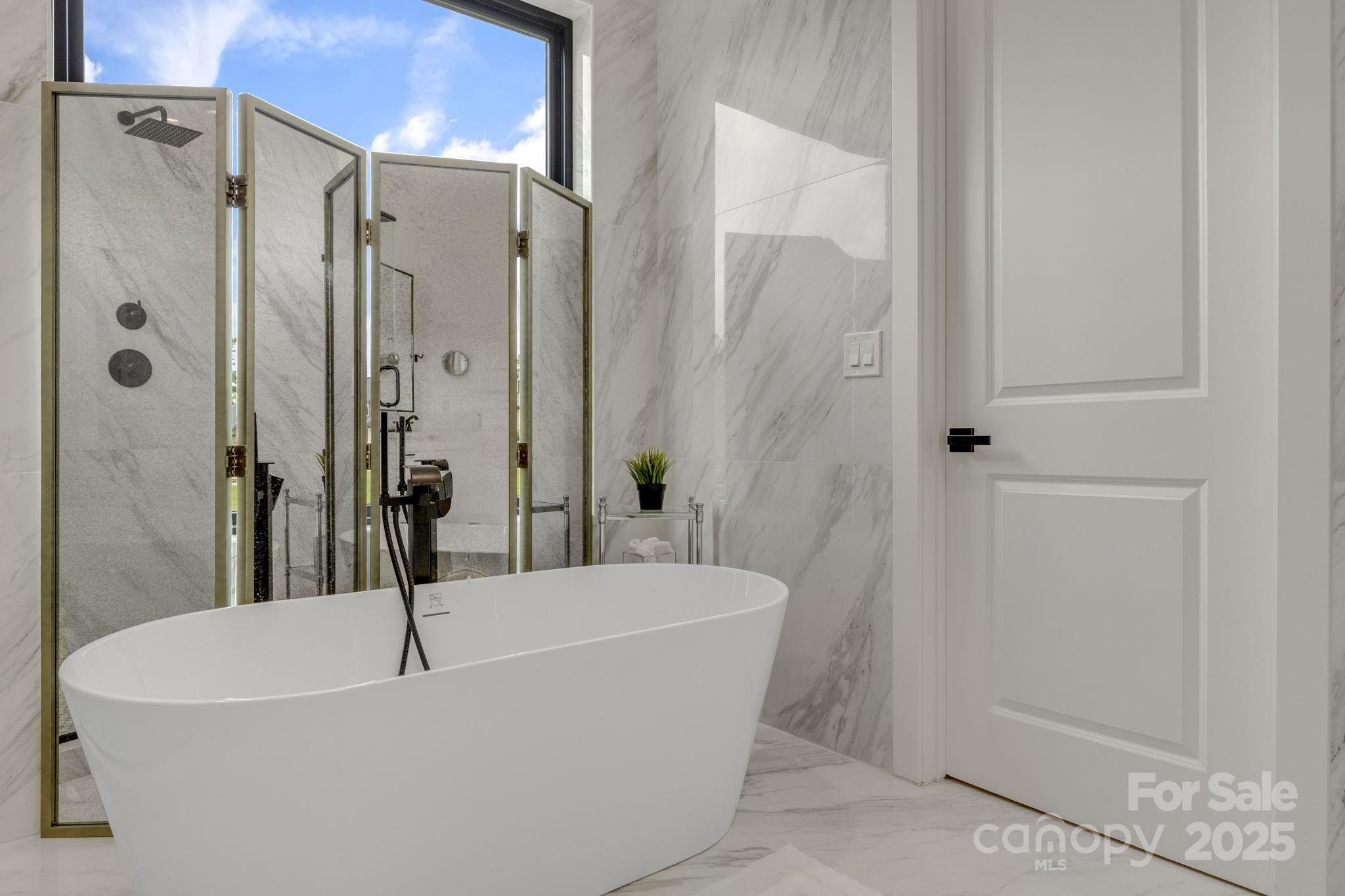 416 World Tour Drive Inman, SC 29349 - Photo 22 of 45 a white bath tub sitting next to a shower