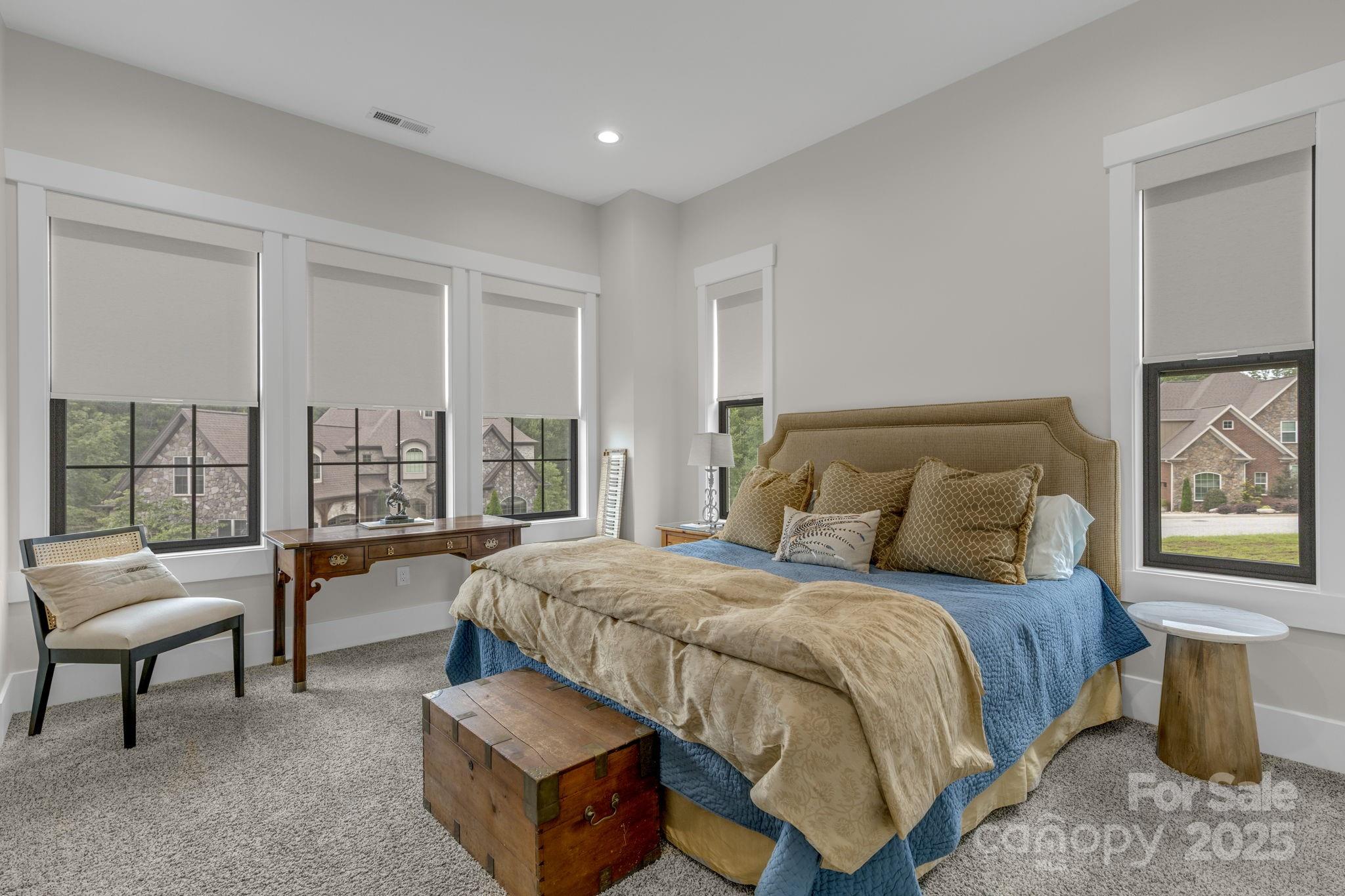 416 World Tour Drive Inman, SC 29349 - Photo 27 of 45 a bedroom with a bed and a couch