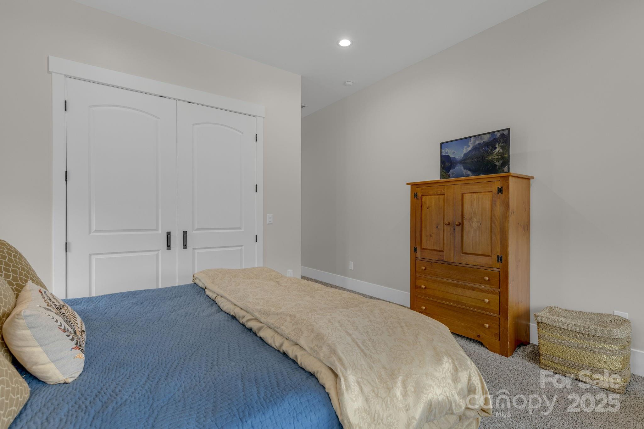 416 World Tour Drive Inman, SC 29349 - Photo 28 of 45 a bedroom with a bed and cabinets