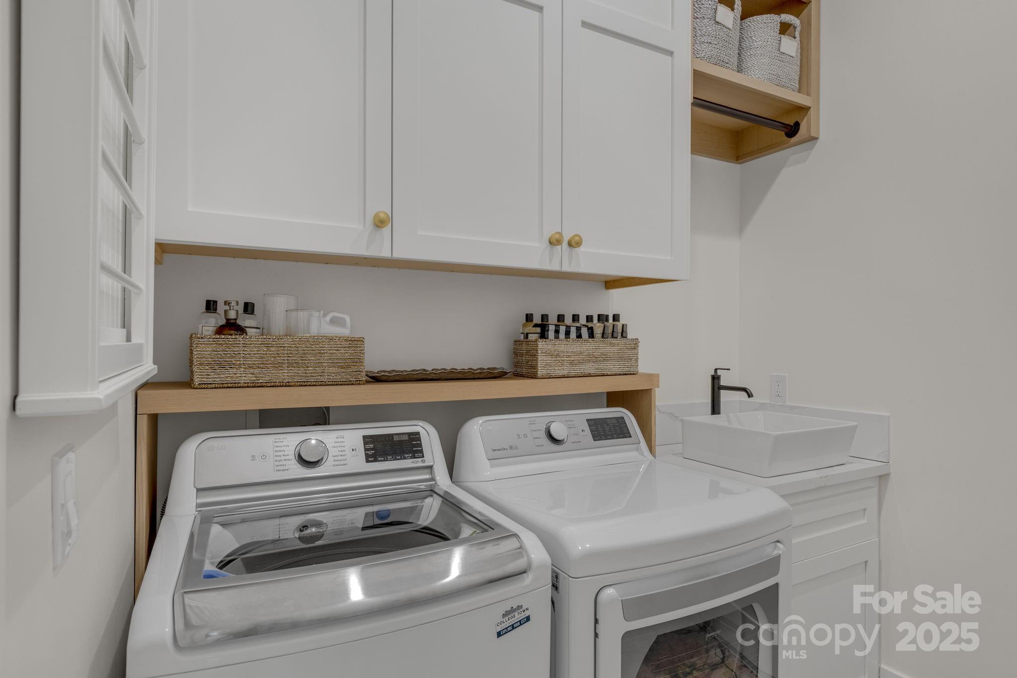 416 World Tour Drive Inman, SC 29349 - Photo 30 of 45 a utility room with dryer and washer
