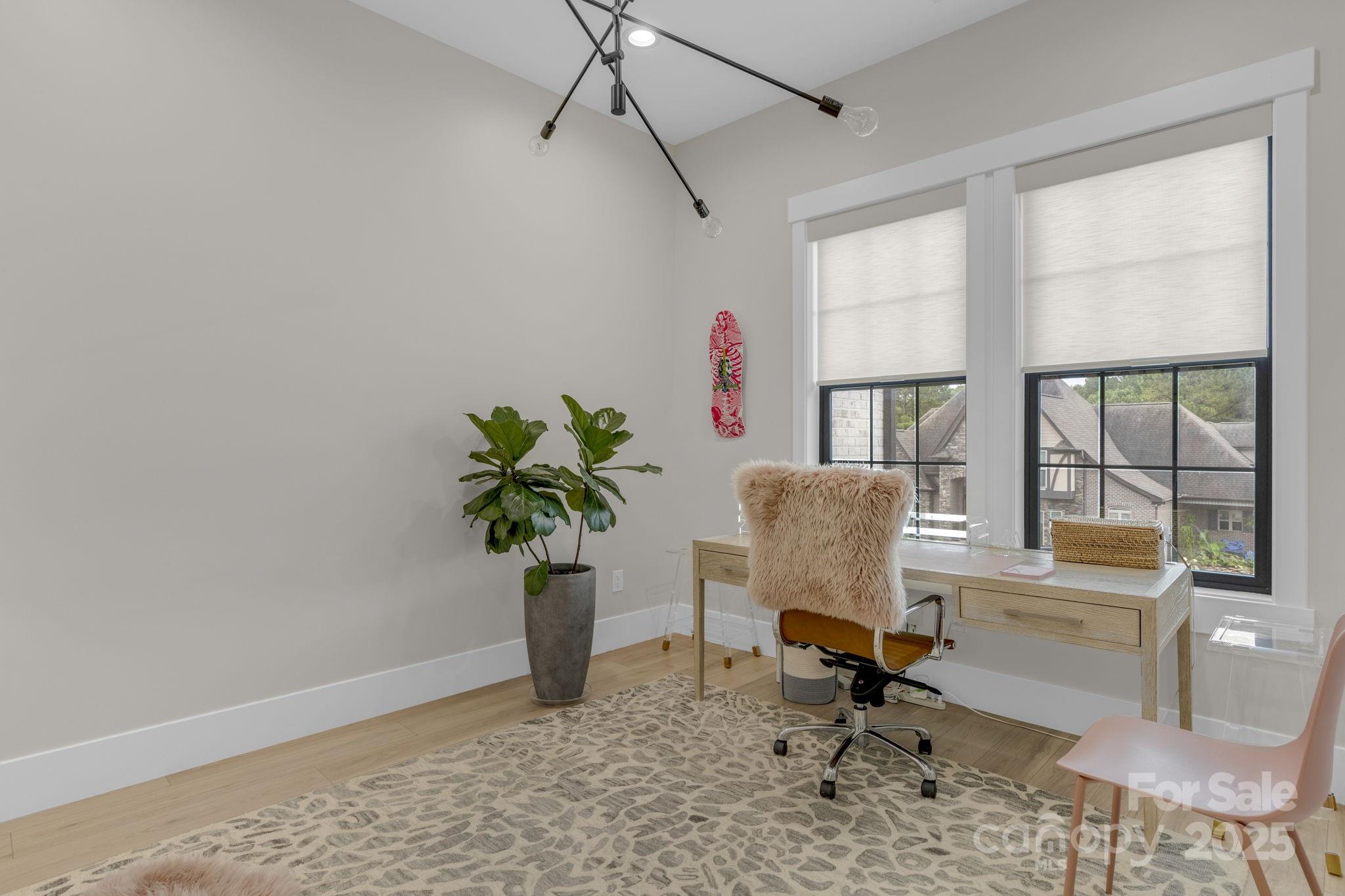 416 World Tour Drive Inman, SC 29349 - Photo 8 of 45 a view of a workspace with furniture and a window