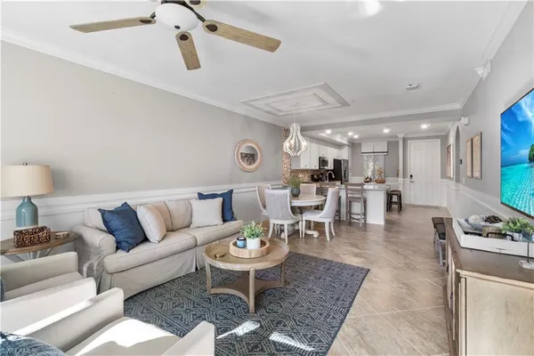 a living room with furniture and a table