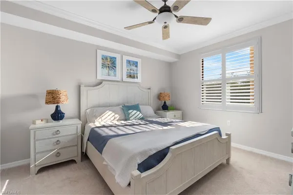 a bedroom with bed and a window
