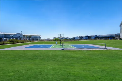 a view of swimming pool with a patio and a yard