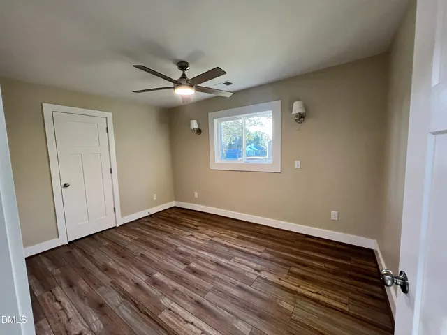 a kitchen with a sink stainless steel appliances and cabinets