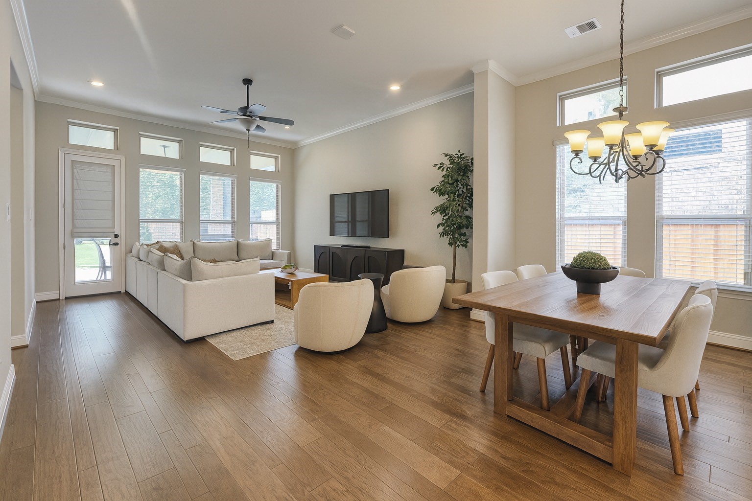 4326 Victoria Pine Drive Spring, TX 77386 - Photo 36 of 36 a living room with furniture a chandelier and a table