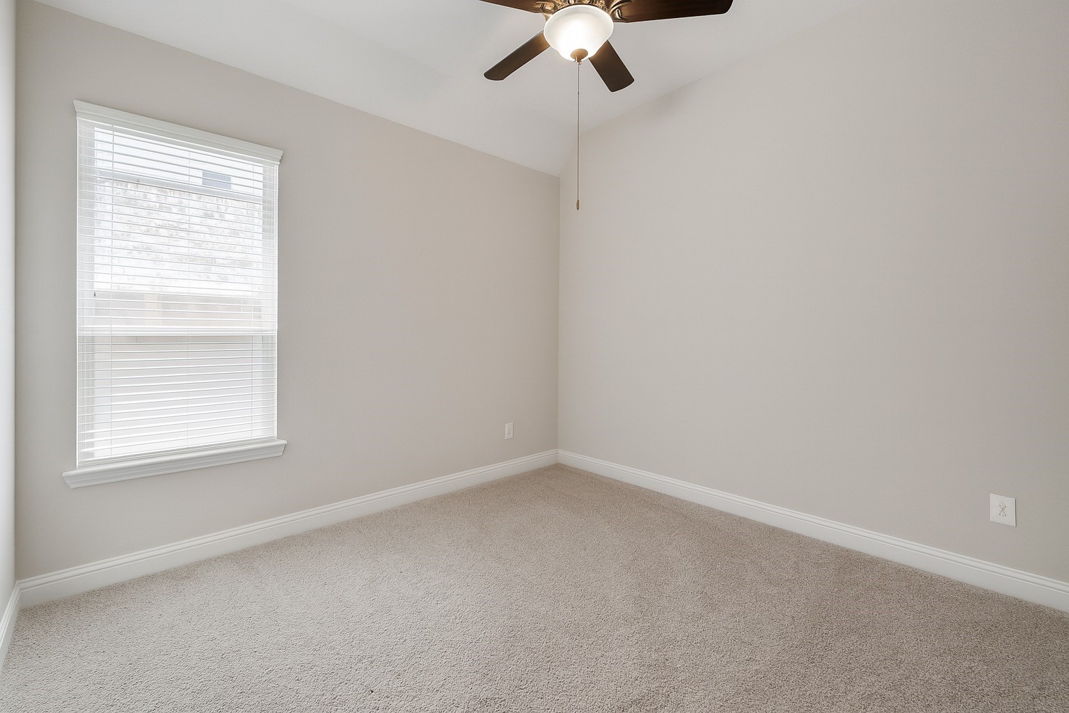 4326 Victoria Pine Drive Spring, TX 77386 - Photo 21 of 36 an empty room with a window and a fan