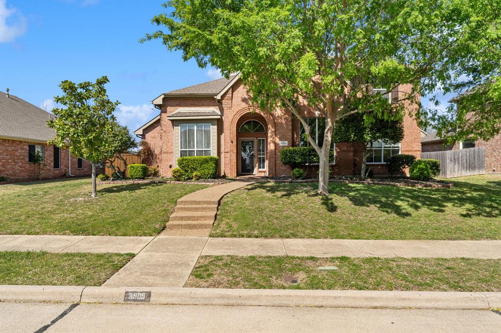 View of front of house featuring brick siding