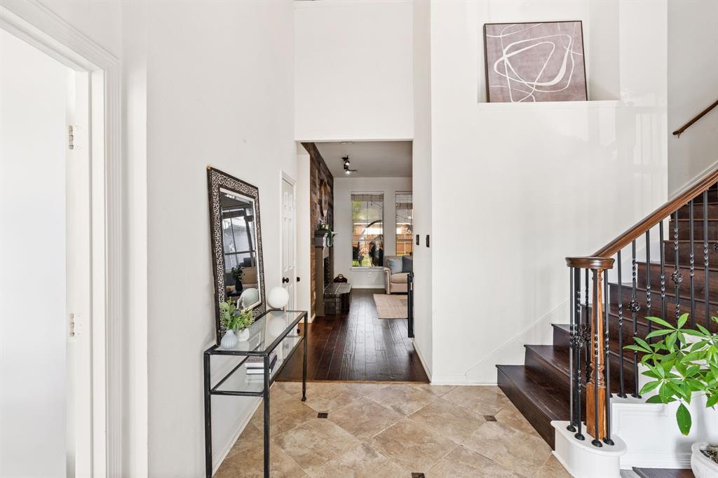 3905 Lakeside Drive Rowlett, TX 75088 - Photo 12 of 39 Foyer entrance featuring stairway and a high ceiling