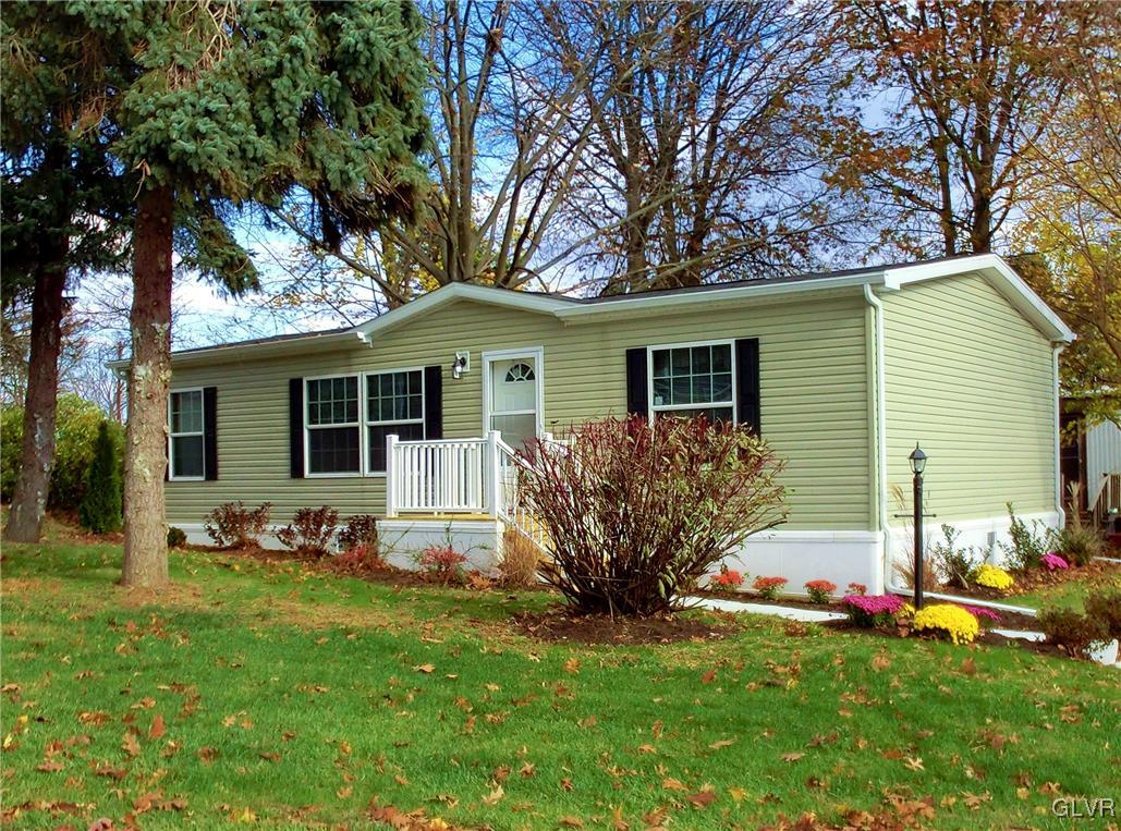 8871 Turkey Ridge Road Breinigsville, PA 18031 - Photo 1 of 8 a front view of house with yard and green space