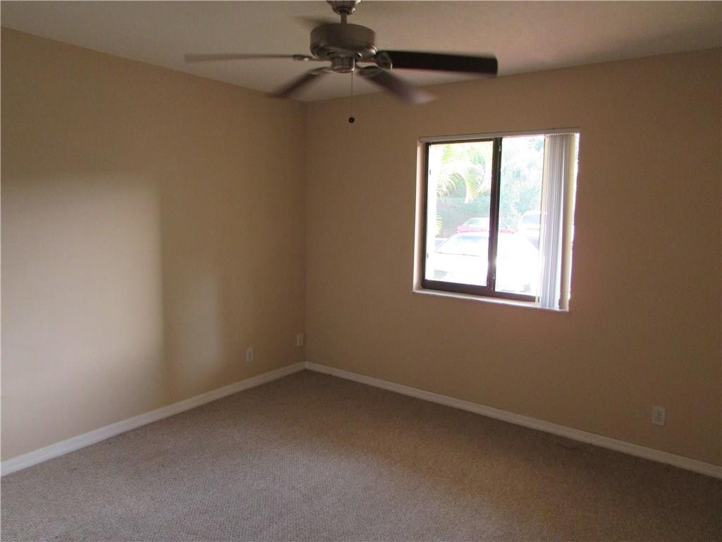 140 Northwest 70th Street, Unit 102 Boca Raton, FL 33487 - Photo 11 of 16 Guest Bedroom